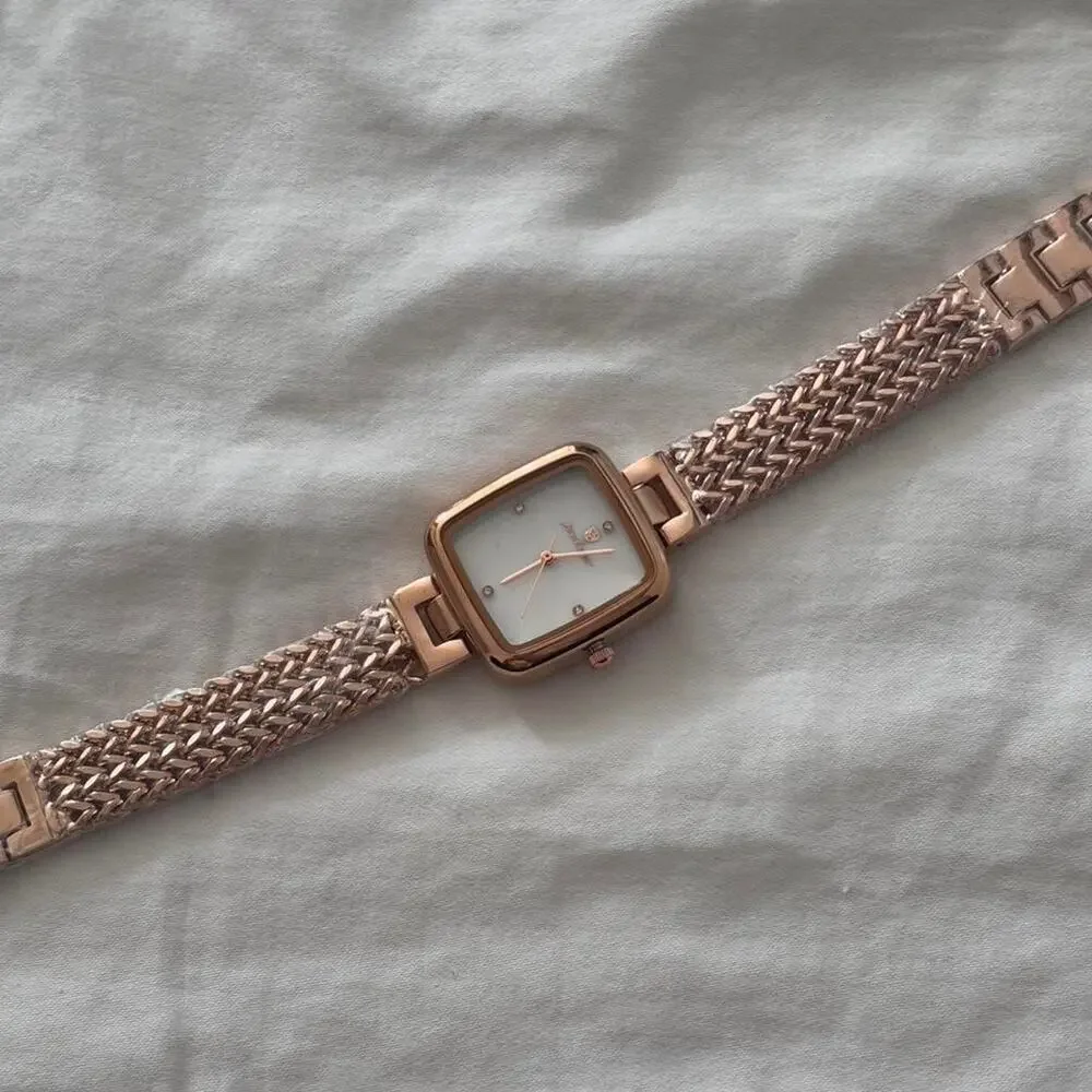 Rose gold watch with white